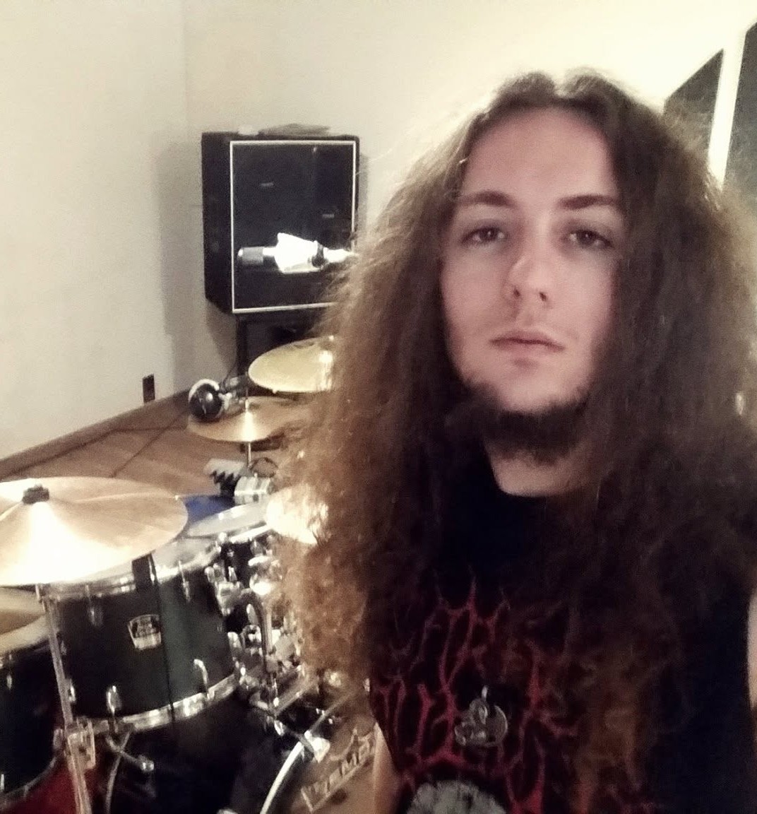 Studio session photo of Joaquim Sousa, the drummer of The Mouldy Cave Society recording drums at Noise Magnet Studio in Guimarães, Portugal