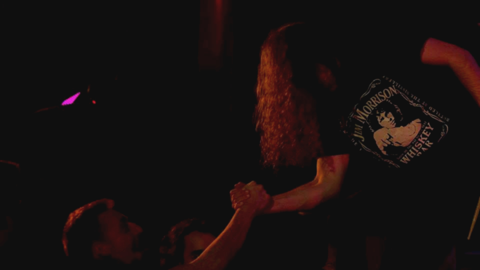 Joaquim Sousa, drummer for The Mouldy Cave Society performing live at TOCA and greeting fans